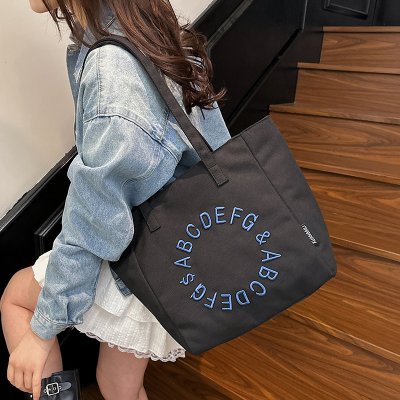 Embroidered letter canvas bag women's large capacity one-shoulder tote bag niche versatile commuter tote bag