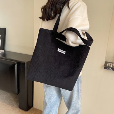 Large capacity commuting bag for women in autumn and winter fashion simple shoulder bag for college students in class bag versatile toy bag