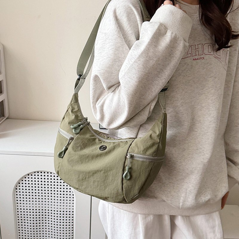 Water-resistant commuting small backpack fashionable and trendy versatile crossbody bag lightweight large capacity dumpling bag