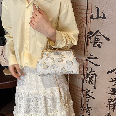 New Chinese style simple and elegant Hanfu cheongsam niche and niche fashion versatile one-shoulder crossbody pearl handheld ancient style light luxury bag