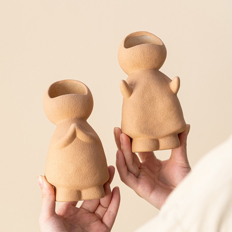 Cute little man looking up at candlestick modern simple ceramic vase high-end home decoration ornaments