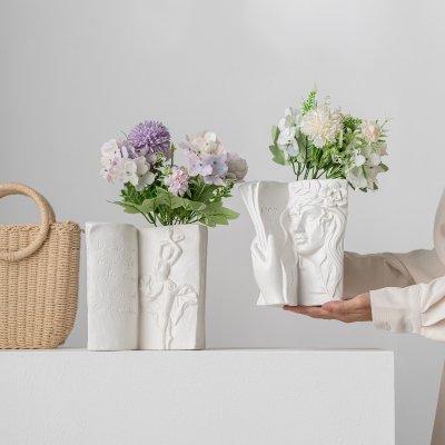 Modern and simple simple white Facebook ceramic vase light luxury ornament art flower insert