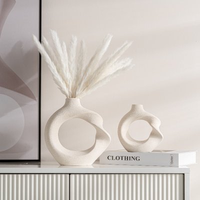 Modern minimalist ceramics, twisted round vases, home decoration ornaments style