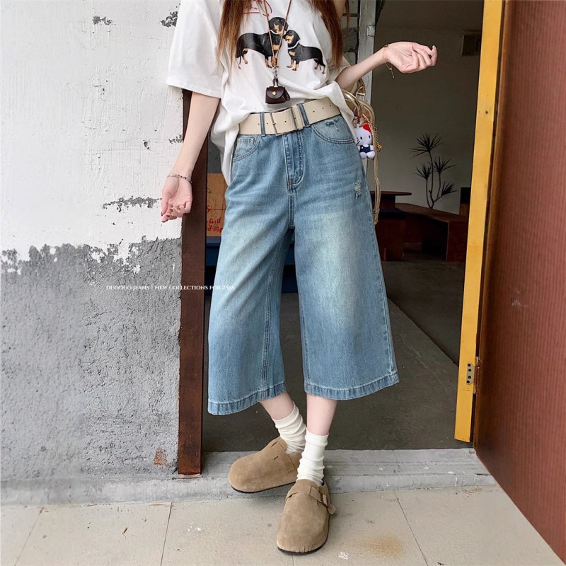 Real shot of American retro high street denim trousers for women in summer high waist ripped wide-leg trousers